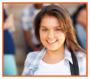 Female student smiling at camera